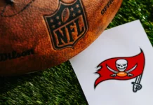 Tampa Bay Buccaneers logo next to a NFL football.