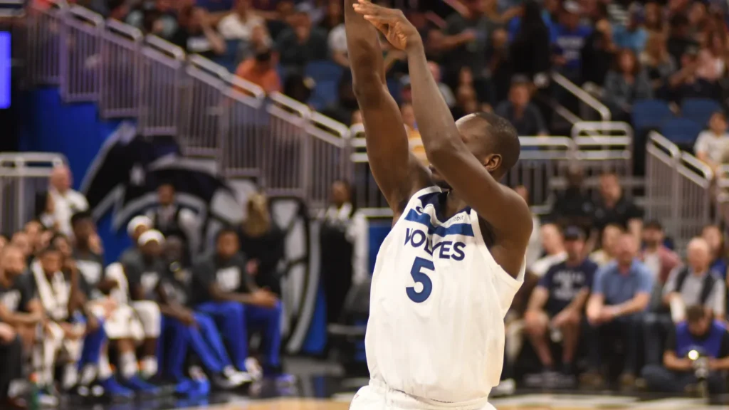 Anthony Edwards of the Minnesota Timberwolves shoots during an NBA game.