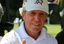 Gary Player smiling into the camera.