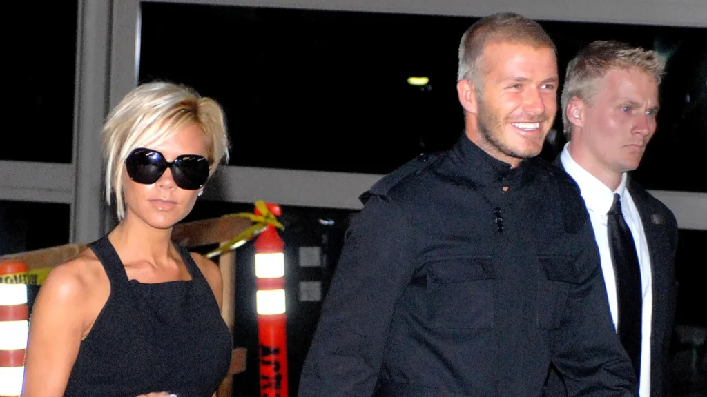 victoria beckham carrying an hermes kelly bag David Beckham out