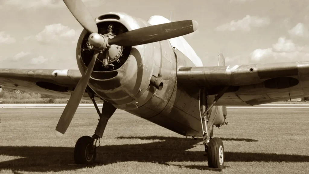 Vintage Avenger aircraft parked on an airfield.