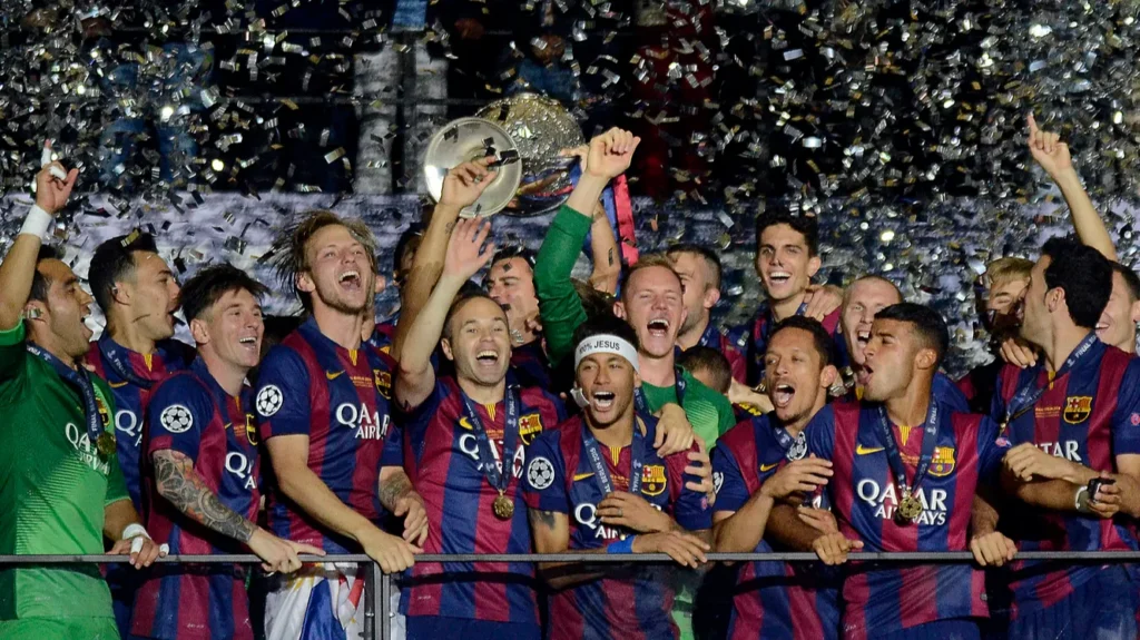 barcelona holding the trophy