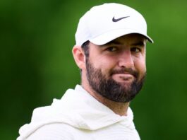 What makes Scottie Scheffler laugh about the arrest that once stunned golf? Scottie Scheffler smiling into the camera at the golf club.