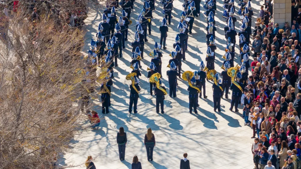 aerial shot of a traditional corfiot philharmonic marching band in