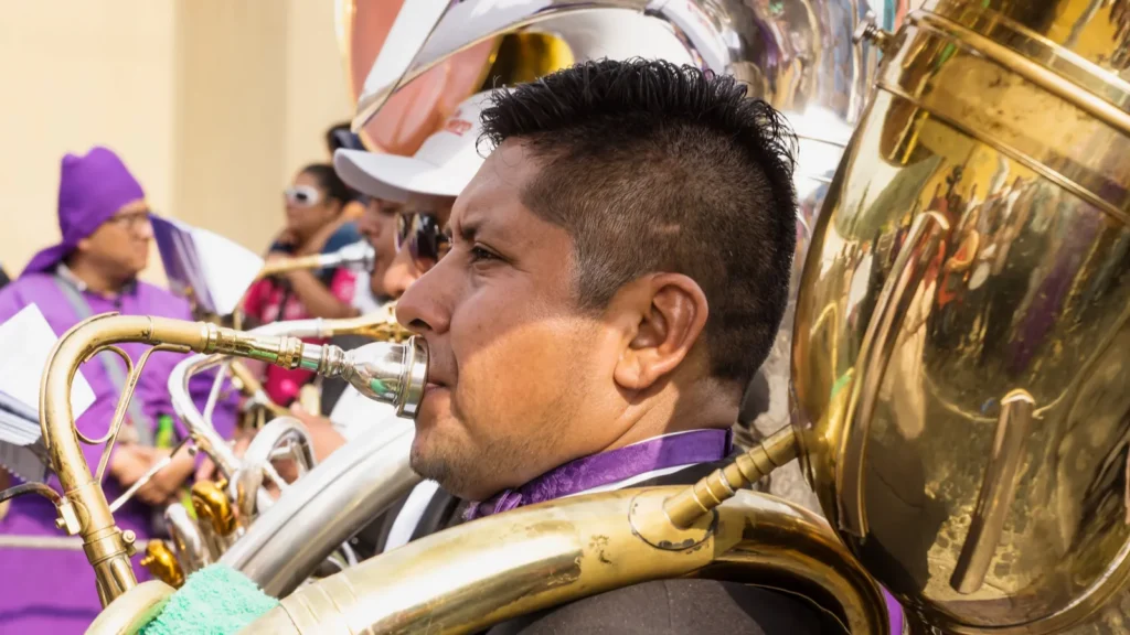 bass tuba player at the procession of san bartolome de