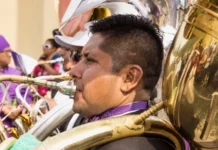 bass tuba player at the procession of san bartolome de