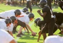boys playing american football