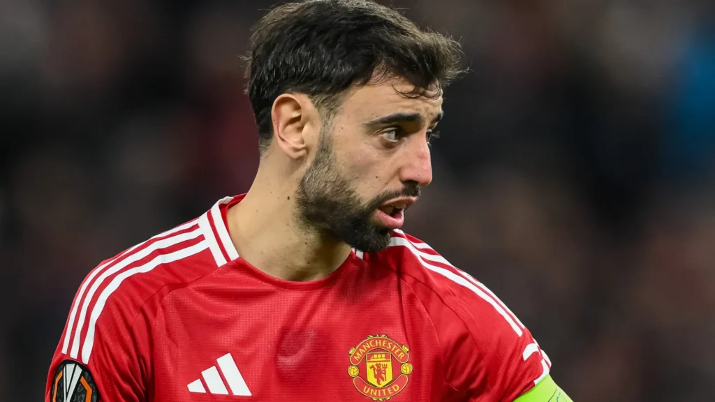 bruno fernandes of manchester united holds the ball ahead of