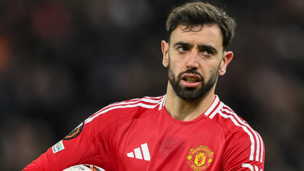 bruno fernandes of manchester united holds the ball