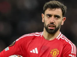 bruno fernandes of manchester united holds the ball
