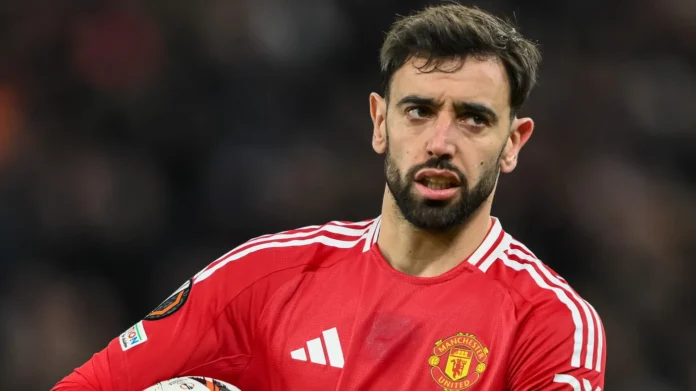 bruno fernandes of manchester united holds the ball