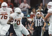 College football sees multiple major upsets during a memorable Saturday slate Texas Longhorns football team player running with ball in the hand.