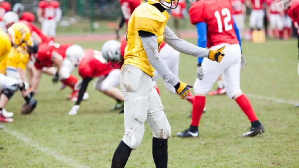 Football team laughing after a loss
