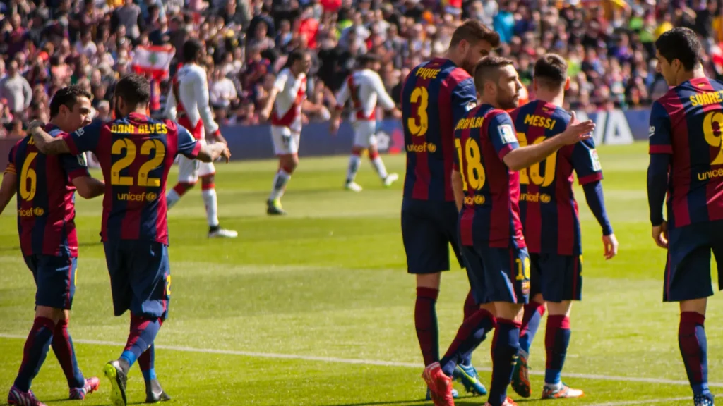 FC Barcelon players discussing with each other
