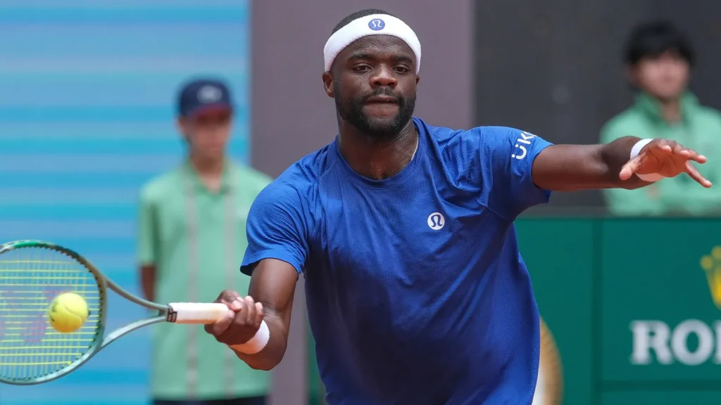 France's Tiafoe in action during a tennis match.