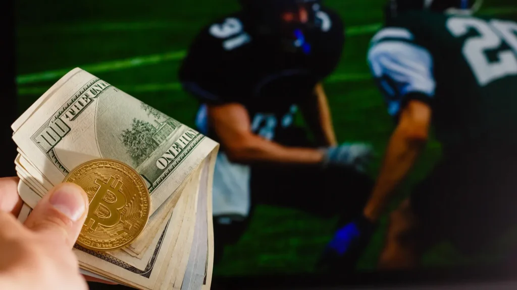 Golden bitcoin and a Dollar against a screen