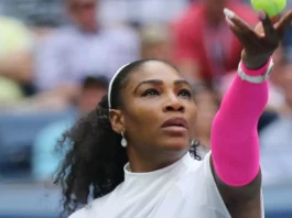 Serena Williams in action during a tennis match.