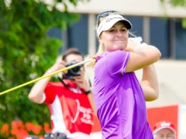 Anna Nordqvist makes a shot during golf match.