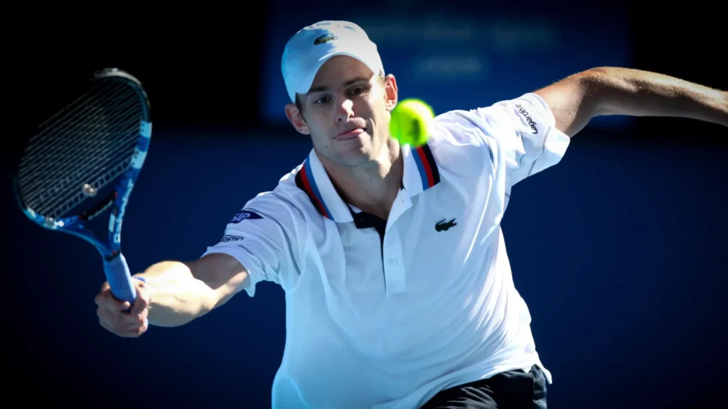 Andy Roddick in action during a tennis game.