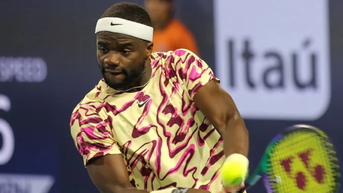 Frances Tiafoe in action during a tennis tournament.
