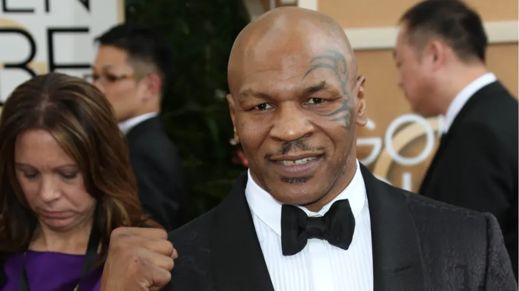 Mike Tyson posing for cameras