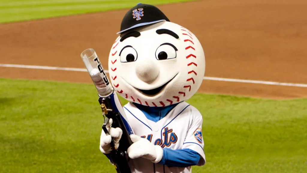 Mr. Met stands on the field during a New York Mets game.