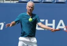 John McEnroe playing tennis.