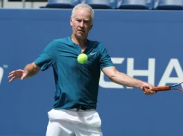 John McEnroe playing tennis.