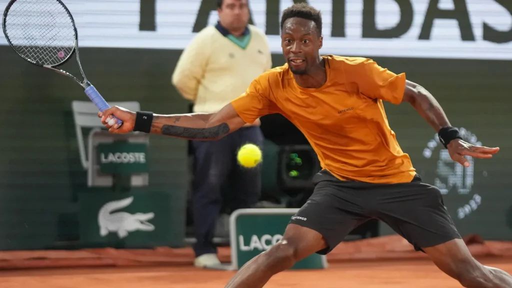 Gaël Monfils in action during a tennis match.