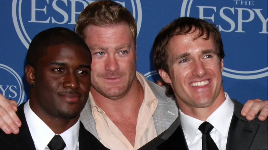 Reggie Bush, Jeremy Shockey, and Drew Brees pose for a picture