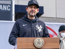 Aaron Judge pushes back on Aaron Boone’s comments about his injury and playoff status Aaron Boone speaking at an event.