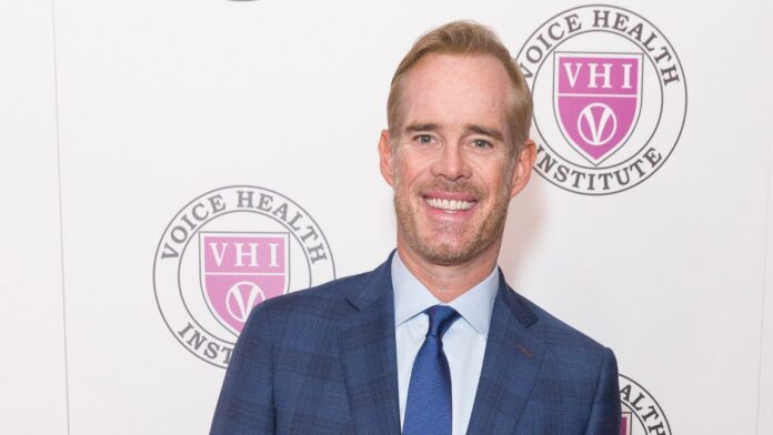 shutterstock joe buck 1040611264 Joe Bucks posing for the camera at an event.