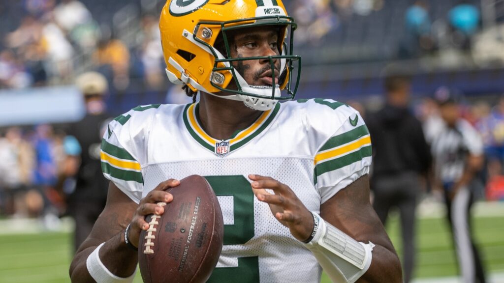 quarterback Malik Willis warms up