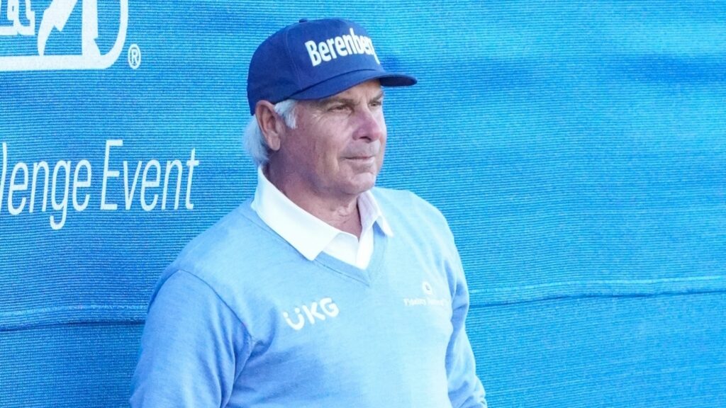 Fred Couples lines up a shot on the 18th green during the first round of the PNC Championship