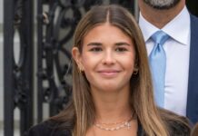 Kai Trump puts college party life aside to pursue her golf ambitions in Miami Kai Trump smiling while posing for the camera.