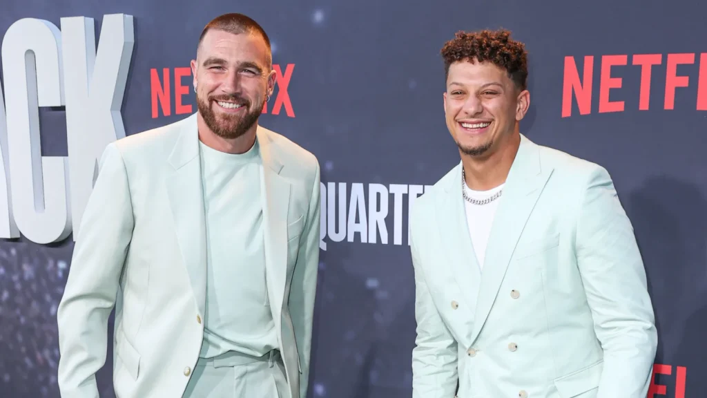 Travis Kelce and Patrick Mahomes arrive at an event.