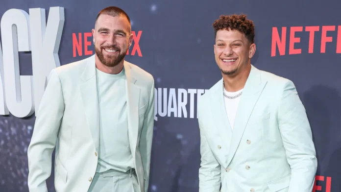 Travis Kelce and Patrick Mahomes arrive at an event.