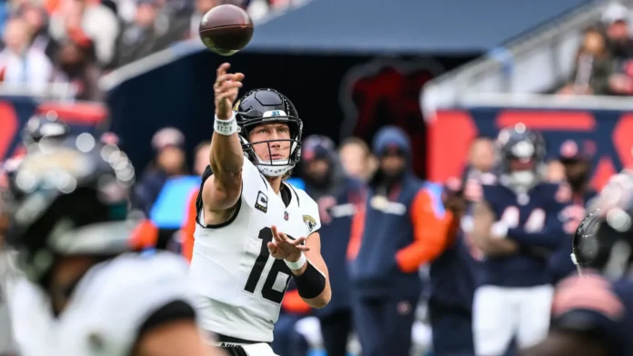 trevor lawrence of the jacksonville jaguars throws down field during Jaguars player throwing the ball.