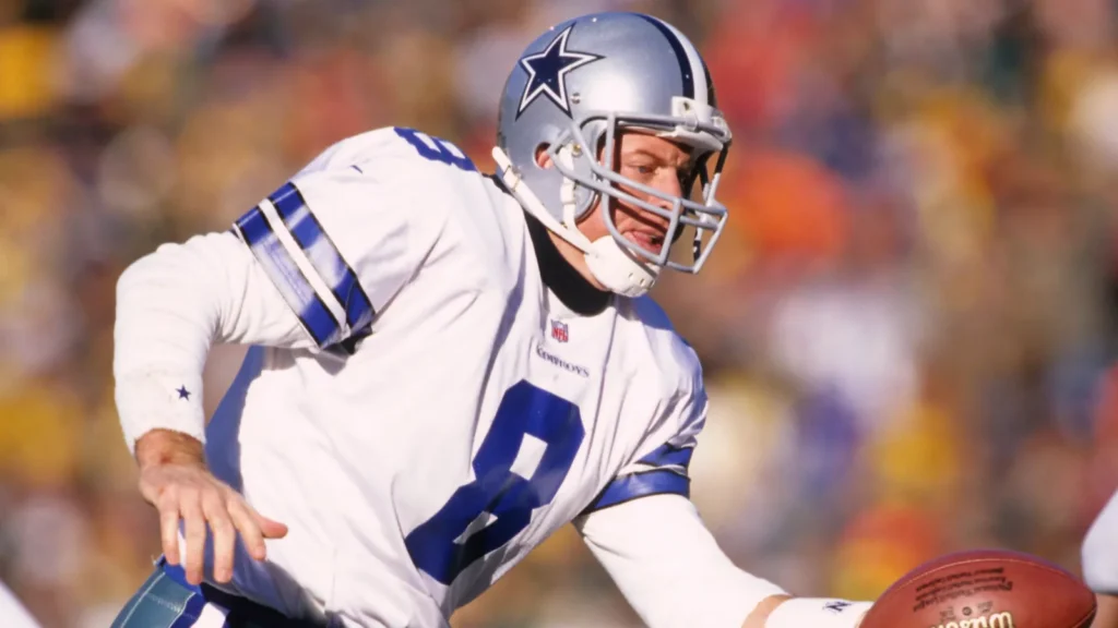 Troy Aikman, quarterback of the Dallas Cowboys in action during a game.