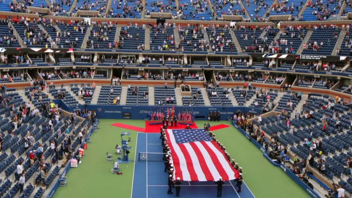 US Marine Corps unfurling American flag during the opening ceremony of U.S. Open.