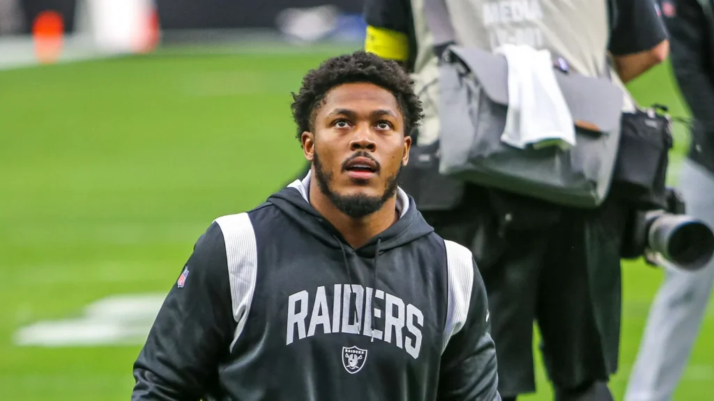 A football player Josh Jacobs in the field