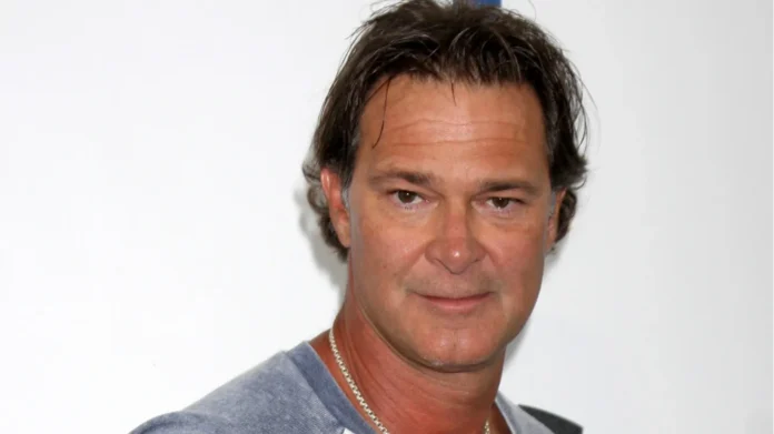 Don mattingly posing with white background
