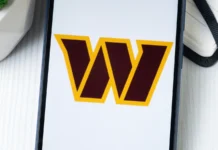 Washington Commanders logo display in a mobile phone screen.