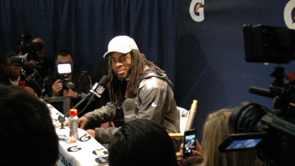 Richard Sherman at a press conference during his time with the Seattle Seahawks.