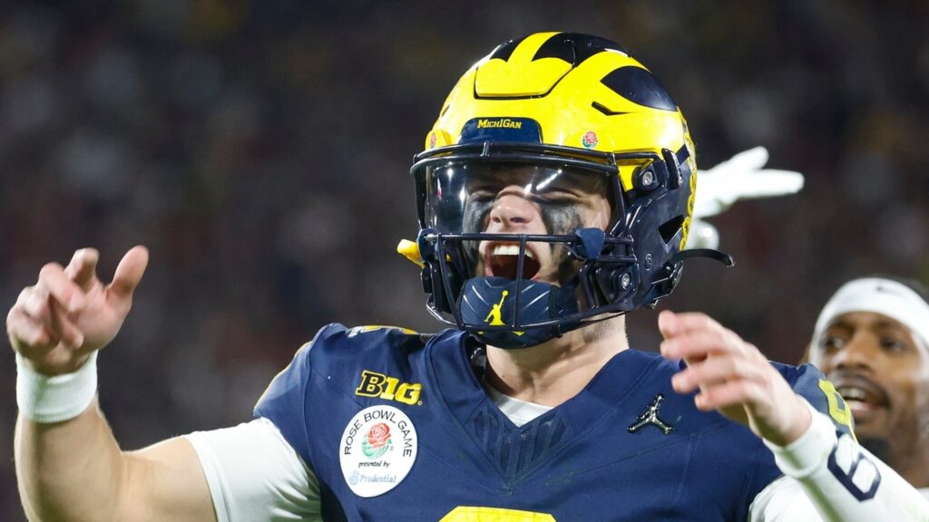 Michigan quarterback J.J. McCarthy #9 celebrates during the Rose Bowl game.